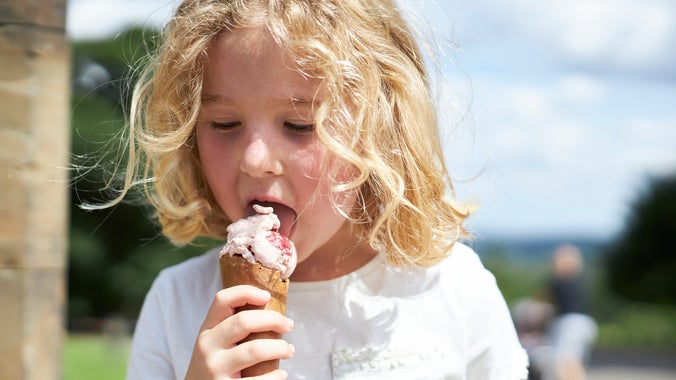 A young visitor enjoys an ice cream at Wentworth Castle Gardens